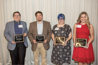 Elise (3rd from left), photo via Grad School Twitter